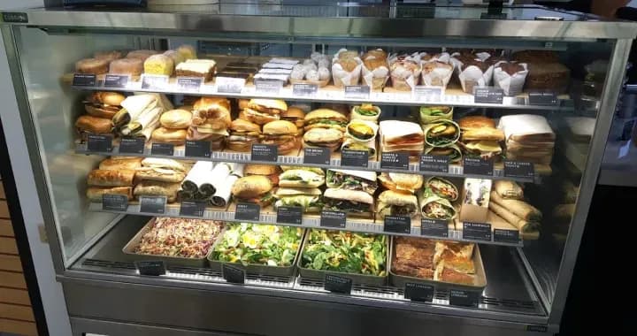 Aroma Cafe, chain cafe offering artisanal coffee & housemade sandwiches