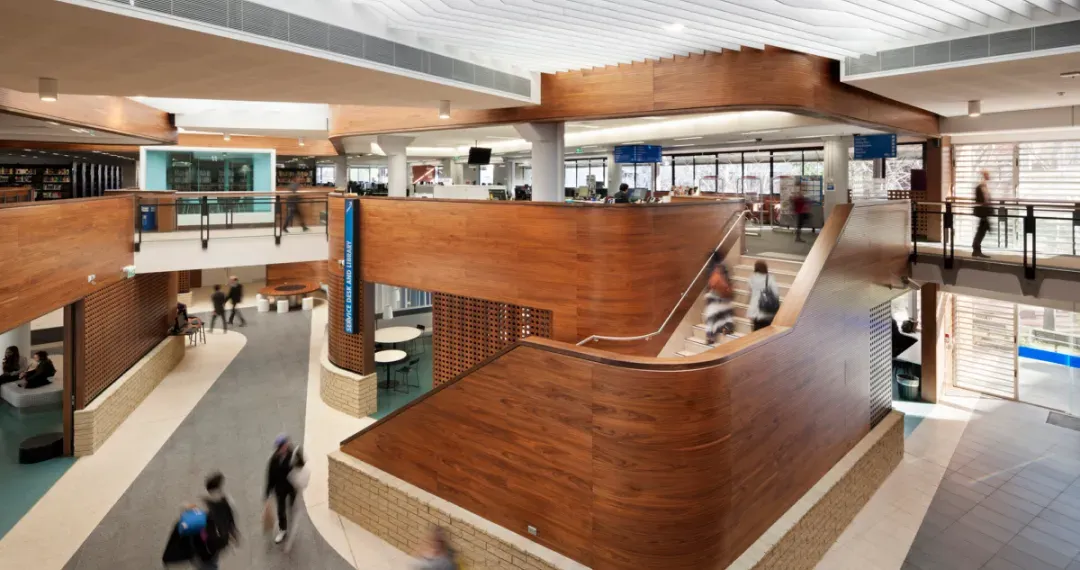 Campus Hallway, featured a double-height laneway cut through the existing building, connecting the public space
