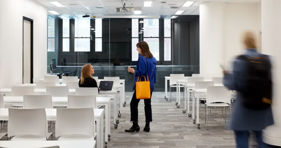 Open areas designed for group study or projects, often with tables, whiteboards