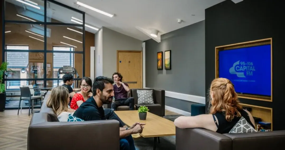 Complimentary use of a communal common room with a pool table, gym equipment and large screen TV