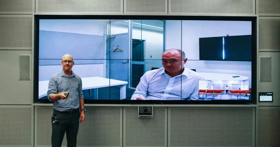 Multi-Purpose Space B, equipped with modern audio-visual technology, including projectors, screens, and sound systems