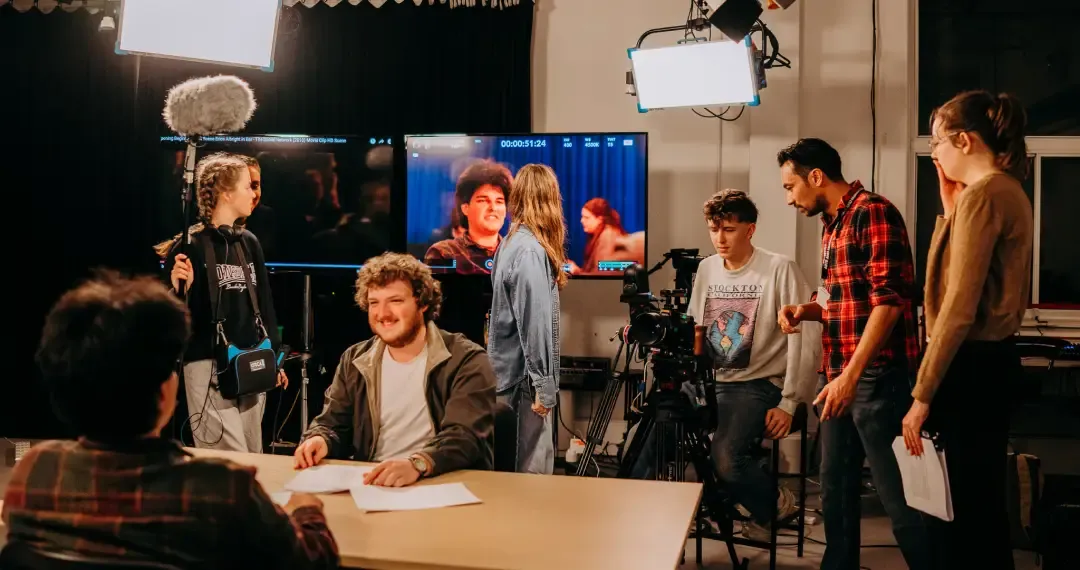 The studio is equipped with high-quality cameras, lenses, lighting rigs, backdrops, and other essential