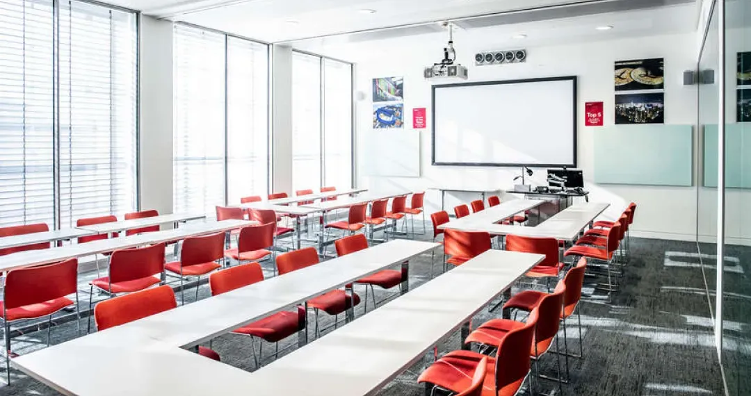 Seminar Room equipped with state-of-the-art AV technology, including integrated computer pods, data screens, projectors