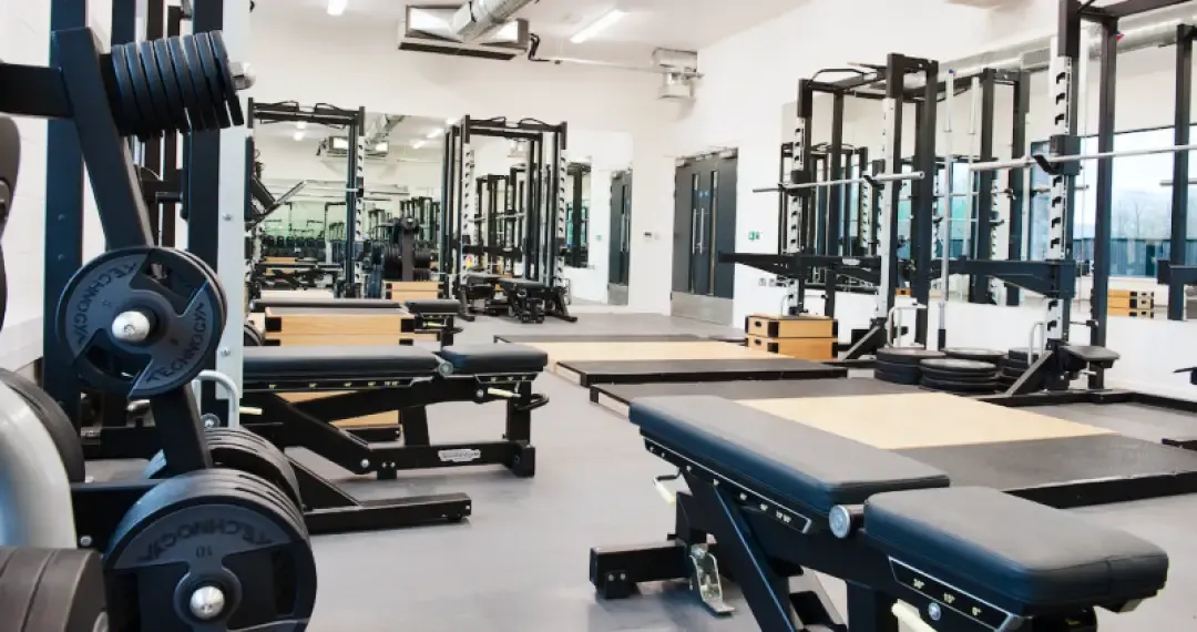 The weight room is equipped with state-of-the-art resistance training machines and free weights