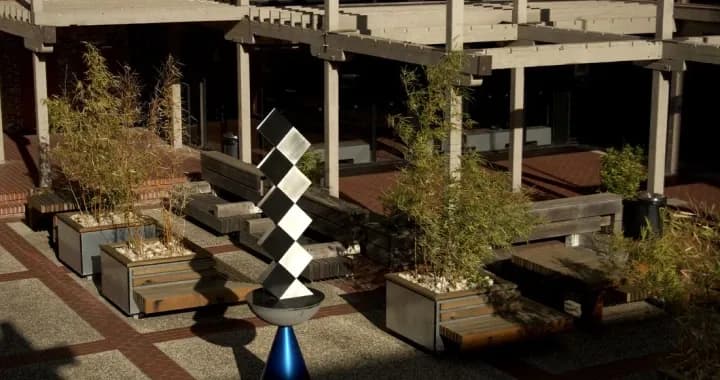 John Hay Courtyard, there are tables and chairs set up for students to relax in the courtyard