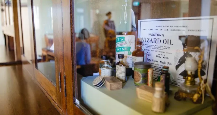 A collection of medical artefacts on display in the Mayne Medical School building