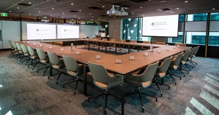 Meeting Room with roundtables and audio-visual equipment
