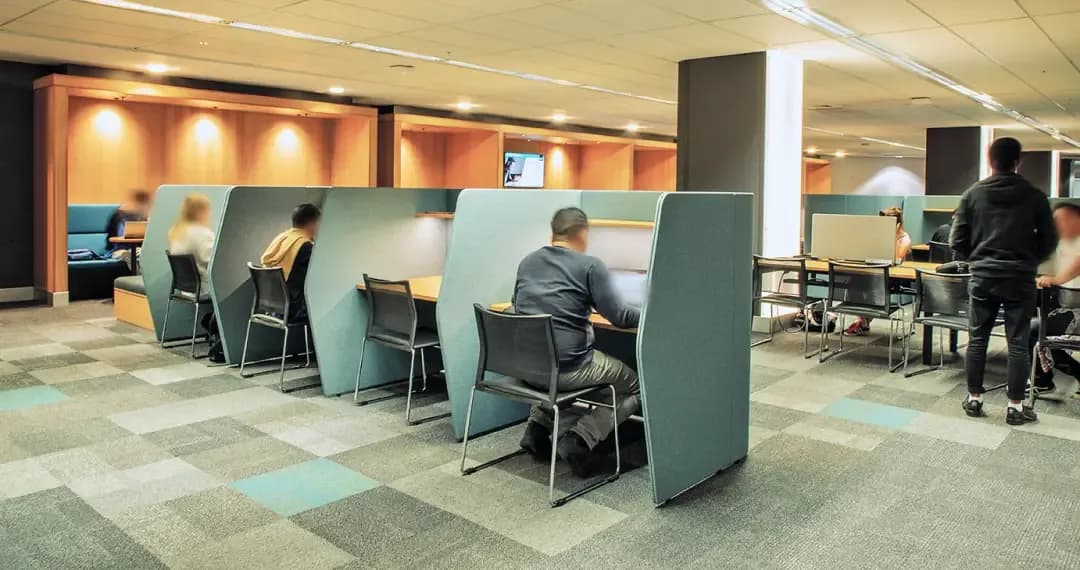 Library has group study rooms, adaptive tech rooms, a “One Button Studio” for recordings, tech zones with PCs etc