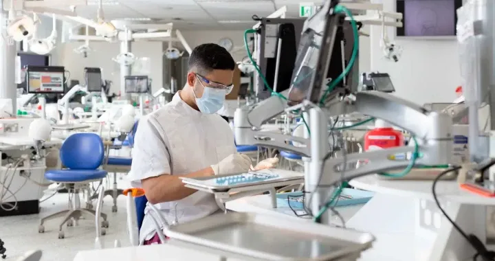 Student practicing dental skills in the simulation clinic