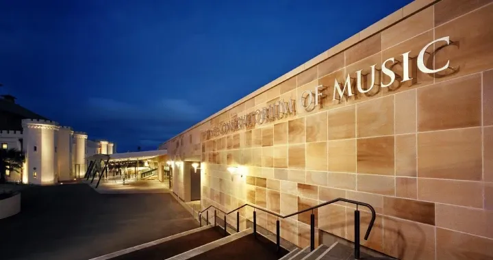 The Conservatorium of Music forecourt at night.